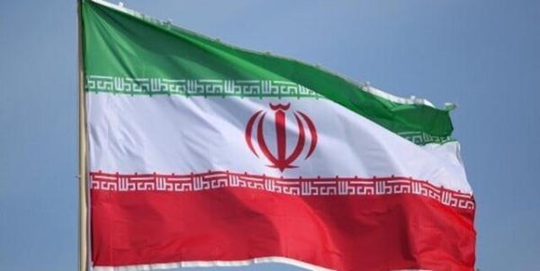 عکس ، تصحیح نصب پرچم ایران در هتلی در آستاراخان روسیه